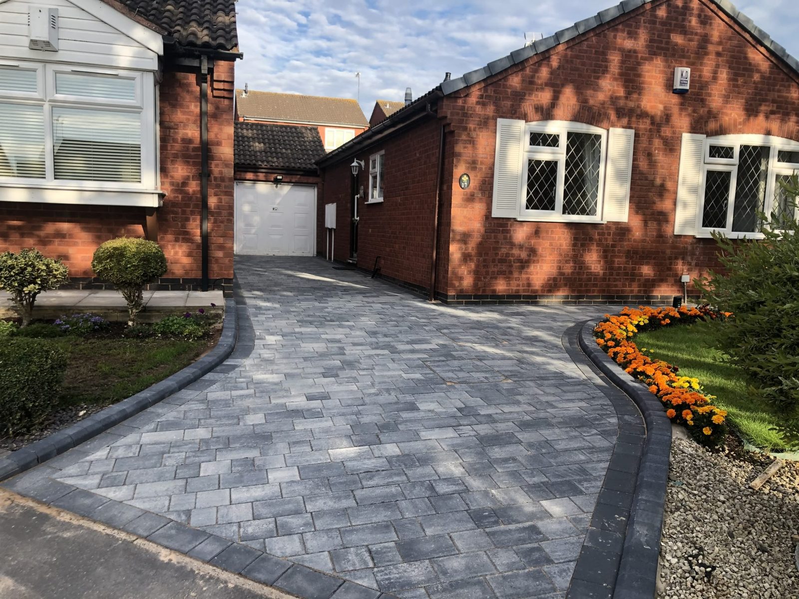 Grey block paved driveway by County Surfacing Contractors